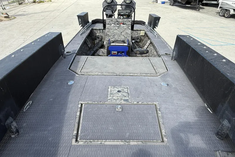 Slide: The Image of 2018 Gator Tail Extreme Series 2060cc boat interior with spacious deck and storage compartments. - 9