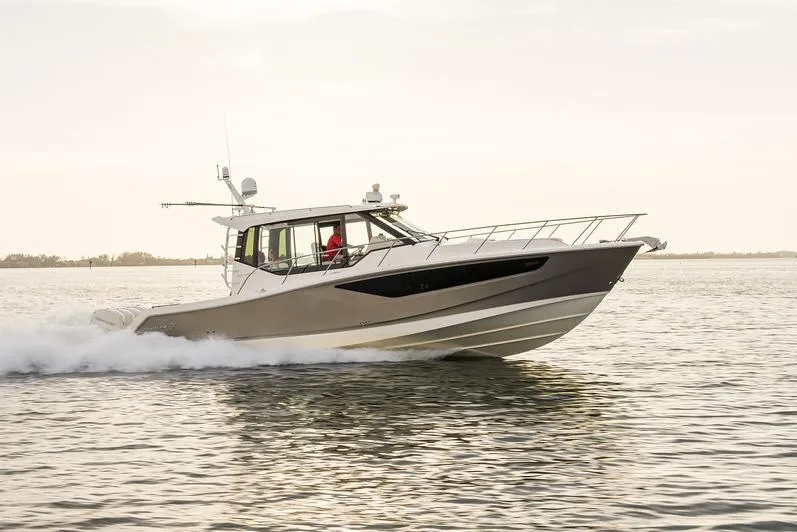 Slide: The Image of Manufacturer Provided Image: 2026 Boston Whaler 405 Conquest cruising on open water. - 3