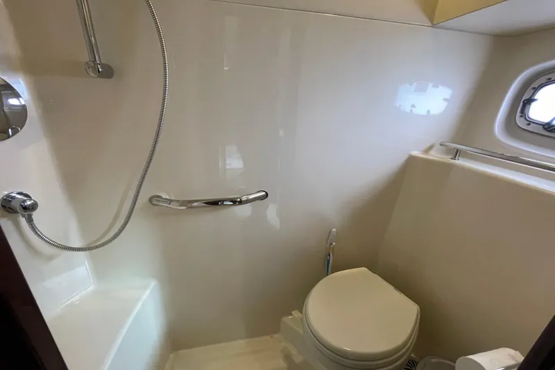 Slide: The Image of Bathroom interior of 2009 Sea Ray 480 Sundancer yacht with shower and toilet. - 20