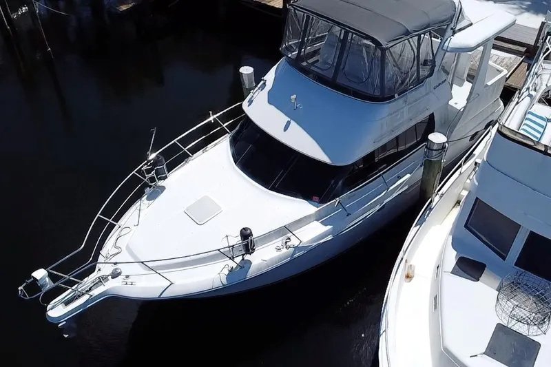 Slide: The Image of 2003 Carver 356 Motor Yacht docked at marina, aerial view. - 1