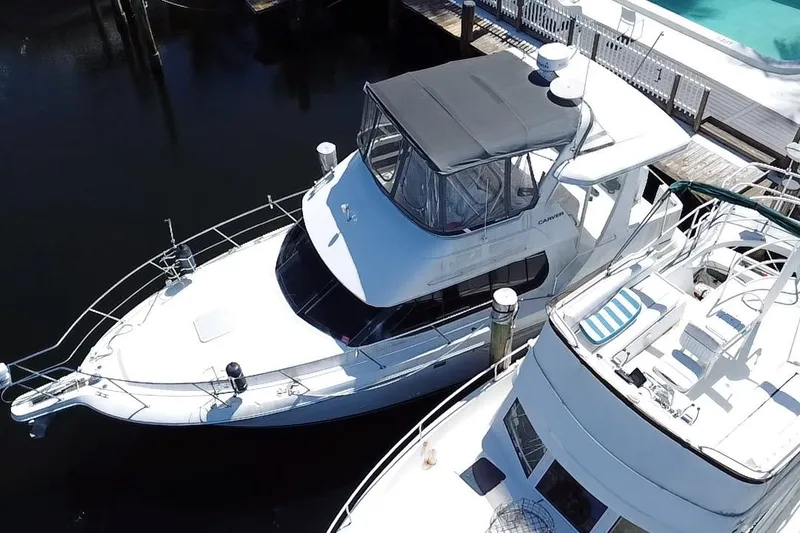 Slide: The Image of 2003 Carver 356 Motor Yacht docked at marina, aerial view. - 6