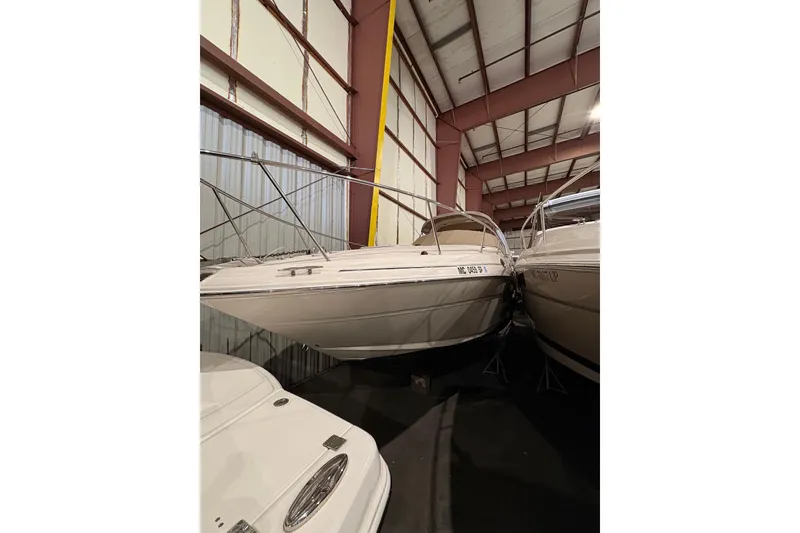 Slide: The Image of 2004 Searay 280 Sundancer boat stored indoors, side view. - 3