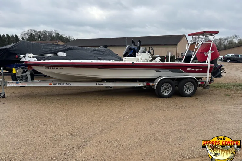 Slide: The Image of 2005 Ranger 223 Cayman boat on trailer at D&R Sports Center. - 3