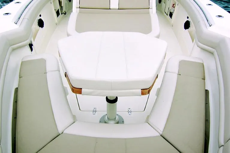 Slide: The Image of Manufacturer Provided Image: Luxurious seating area on 2025 Boston Whaler 380 Outrage boat. - 8