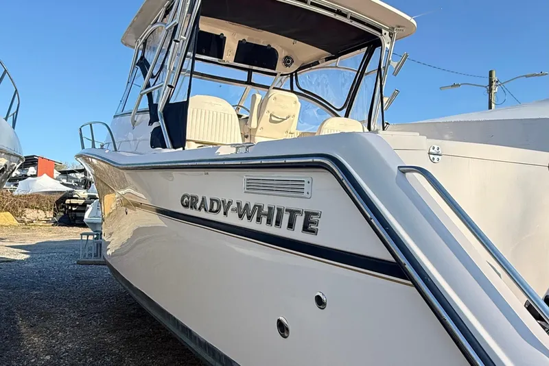 The Image of 2013 Grady-White Express 330 boat docked at marina. - 0