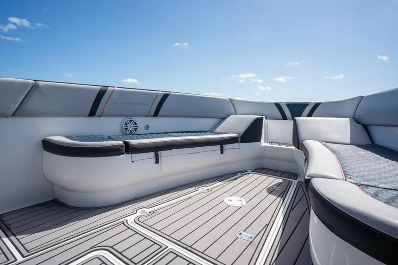 Slide: The Image of Interior view of 2014 Midnight Express 37 Open boat with cushioned seating and sleek design. - 15
