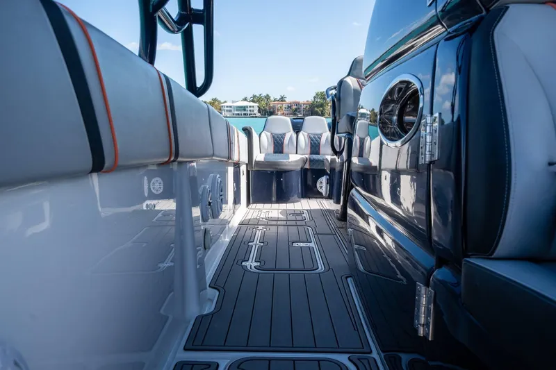 Slide: The Image of 2014 Midnight Express 37 Open boat interior with sleek seating and modern design. - 23