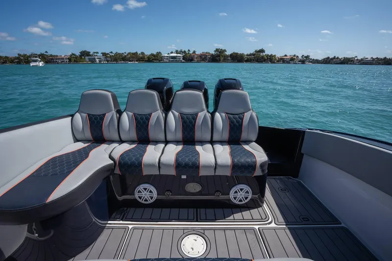 Slide: The Image of Luxury seating on a 2014 Midnight Express 37 Open boat, with scenic ocean view. - 28