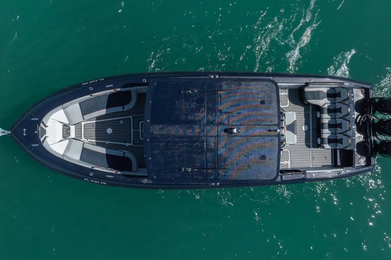 Slide: The Image of Aerial view of 2014 Midnight Express 37 Open boat on turquoise water. - 5