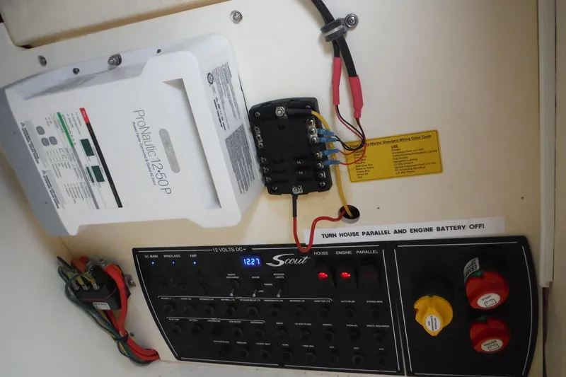 Slide: The Image of Electrical panel of a 2017 Scout 255 Dorado boat with ProNautic charger. - 19