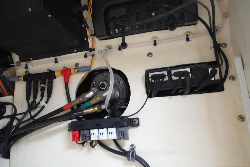 Slide: The Image of Electrical wiring and components inside a 2017 Scout 255 Dorado boat. - 20