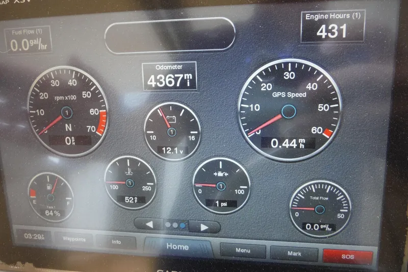 Slide: The Image of Dashboard of a 2017 Scout 255 Dorado showing engine metrics and GPS speed. - 21