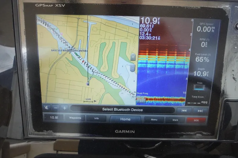 Slide: The Image of Garmin GPSMAP XSV display on 2017 Scout 255 Dorado, showing navigation and sonar data. - 22