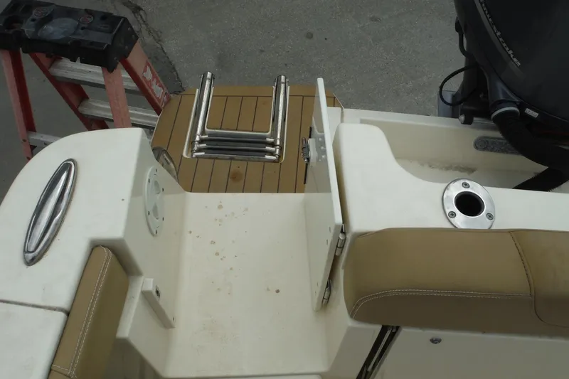Slide: The Image of 2017 Scout 255 Dorado boat stern with ladder and seating area. - 36