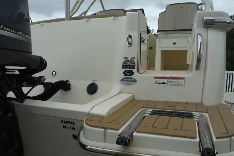 Slide: The Image of 2017 Scout 255 Dorado boat stern with outboard motor and swim platform. - 45