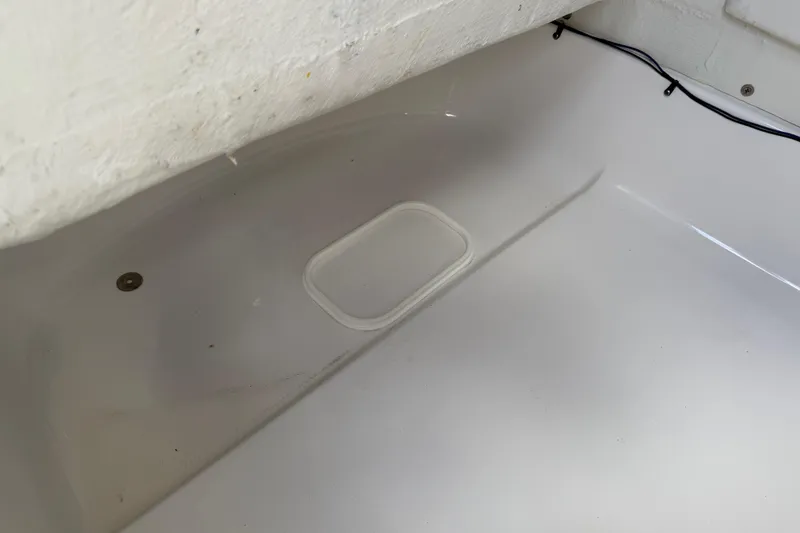 Slide: The Image of Interior view of a 2016 Sportsman Heritage 231 Center Console boat. - 101