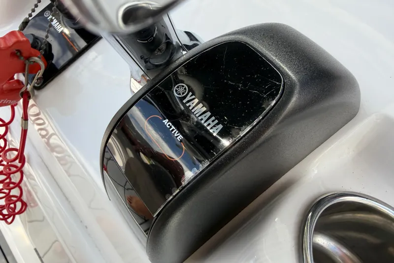 Slide: The Image of Close-up of Yamaha throttle control on 2016 Sportsman Heritage 231 Center Console boat. - 35