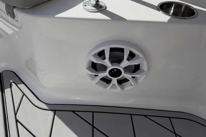 Slide: The Image of 2016 Sportsman Heritage 231 Center Console boat speaker and flooring detail. - 43