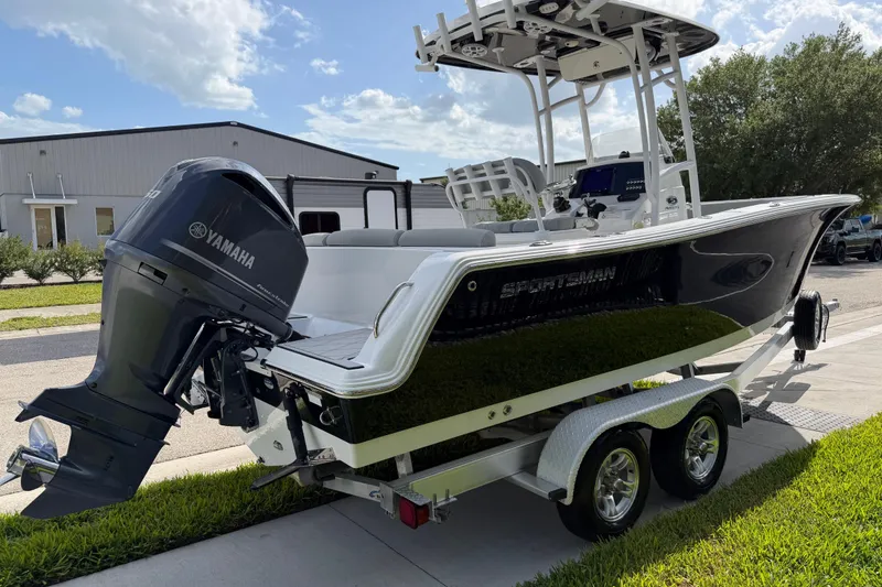 Slide: The Image of 2016 Sportsman Heritage 231 Center Console boat with Yamaha engine on trailer. - 5