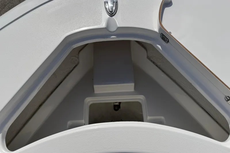 Slide: The Image of Storage compartment of 2016 Sportsman Heritage 231 Center Console boat, open and empty. - 52