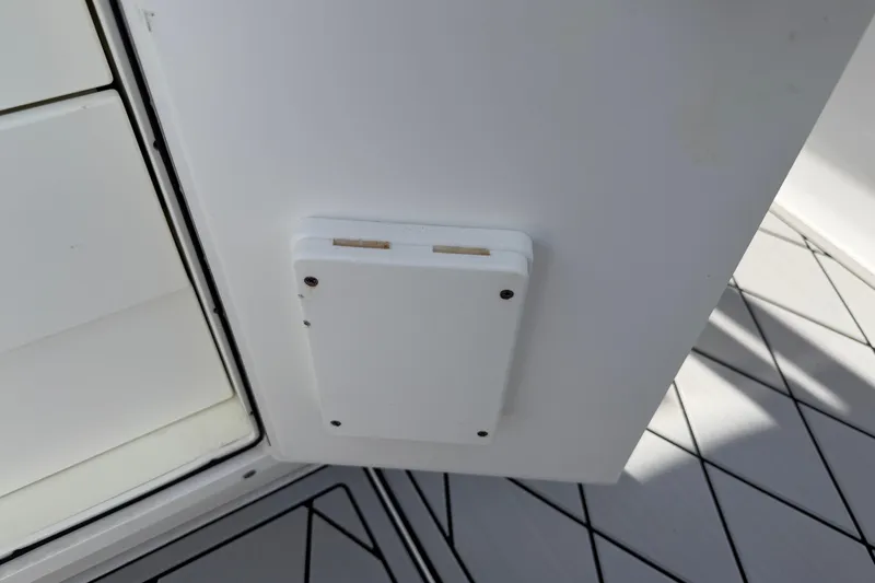 Slide: The Image of 2016 Sportsman Heritage 231 Center Console interior detail with white panel and flooring. - 65