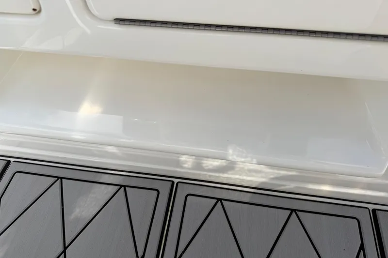 Slide: The Image of 2016 Sportsman Heritage 231 Center Console boat deck with sleek design and modern finish. - 69