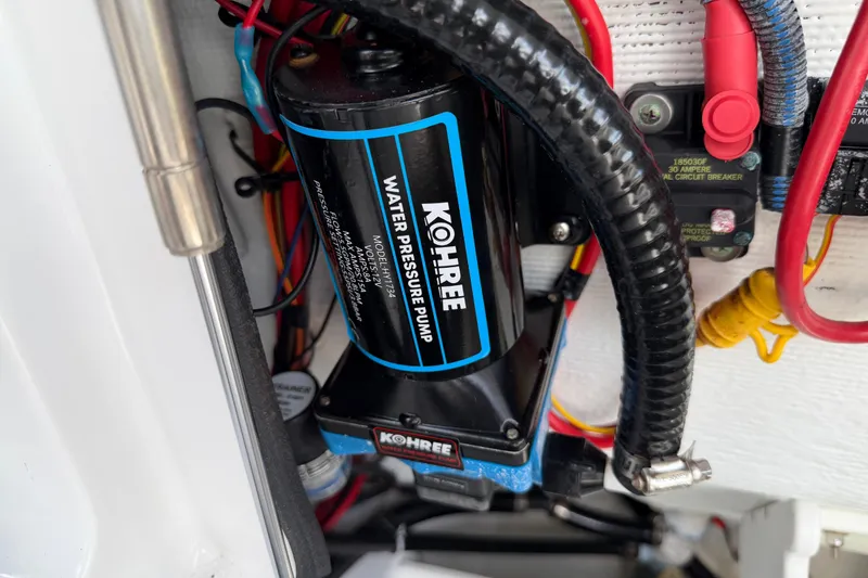 Slide: The Image of Water pressure pump in 2016 Sportsman Heritage 231 Center Console boat, featuring Kohree model. - 75