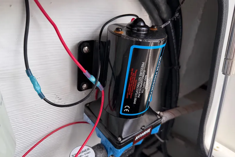 Slide: The Image of Electrical wiring and pump system in 2016 Sportsman Heritage 231 Center Console boat. - 76