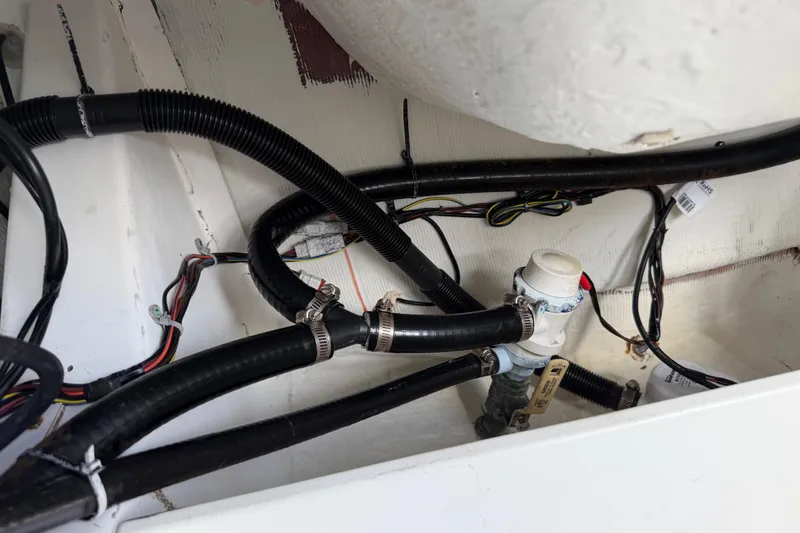 Slide: The Image of 2016 Sportsman Heritage 231 Center Console boat wiring and plumbing details. - 77
