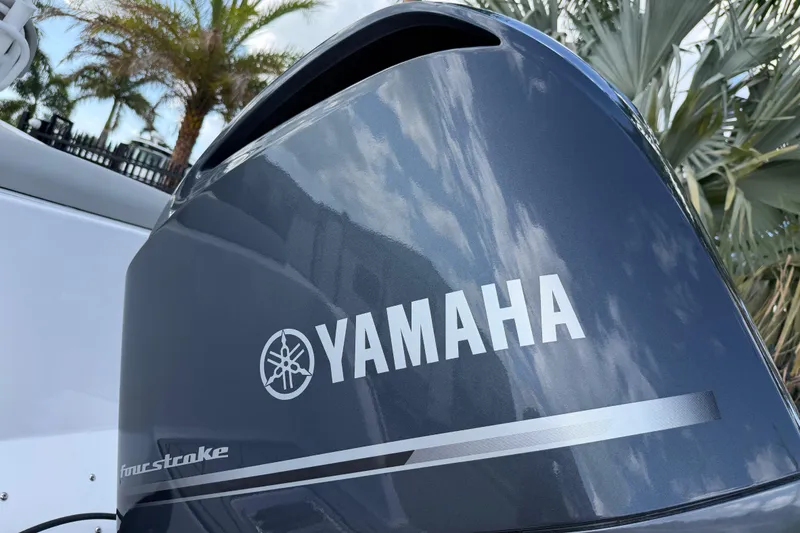 Slide: The Image of Yamaha four-stroke engine on 2016 Sportsman Heritage 231 Center Console boat. - 8
