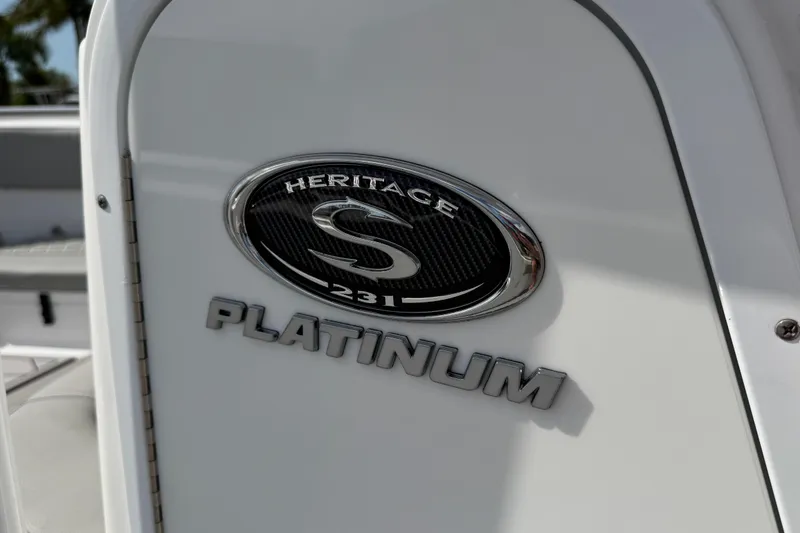 Slide: The Image of 2016 Sportsman Heritage 231 Center Console boat emblem, featuring "Platinum" badge. - 88