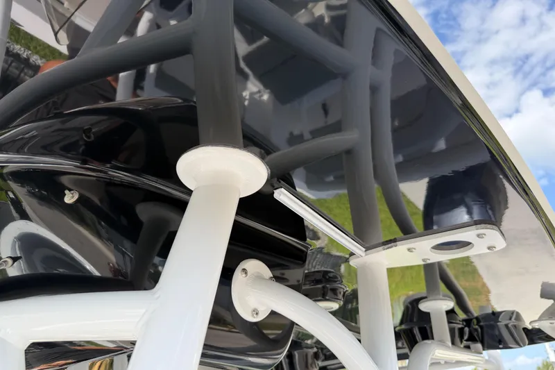 Slide: The Image of 2016 Sportsman Heritage 231 Center Console boat structure, featuring sleek design elements. - 89