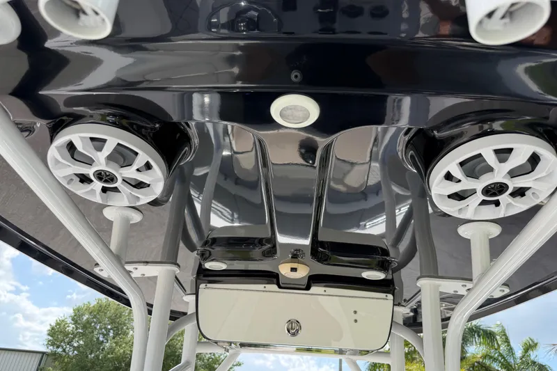 Slide: The Image of 2016 Sportsman Heritage 231 Center Console boat speakers and canopy detail. - 93