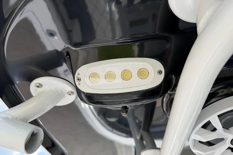 Slide: The Image of LED light fixture on a 2016 Sportsman Heritage 231 Center Console boat. - 94