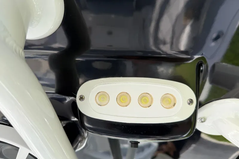 Slide: The Image of LED light fixture on a 2016 Sportsman Heritage 231 Center Console boat. - 95