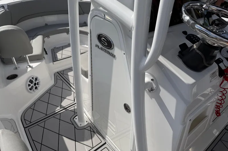 Slide: The Image of 2016 Sportsman Heritage 231 Center Console interior with steering wheel and seating area. - 96