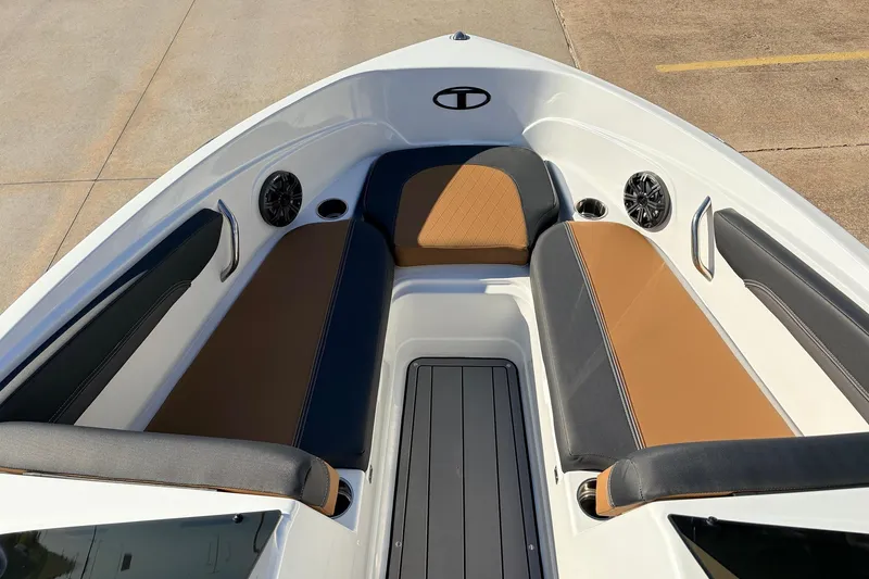 Slide: The Image of 2025 Tahoe 210 Si boat interior with stylish seating and modern design. - 16