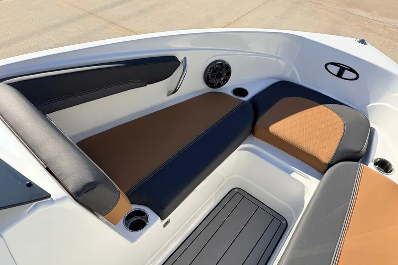 Slide: The Image of Interior seating of 2025 Tahoe 210 Si boat with stylish upholstery and cup holders. - 17