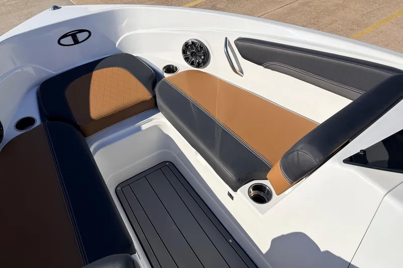 Slide: The Image of Interior seating of 2025 Tahoe 210 Si boat with brown and black upholstery. - 18