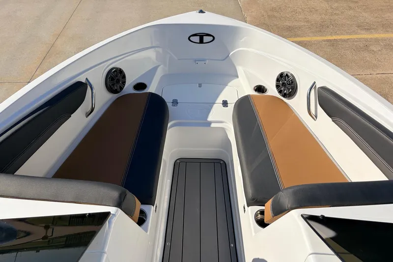 Slide: The Image of 2025 Tahoe 210 Si boat interior with sleek seating and modern design. - 21
