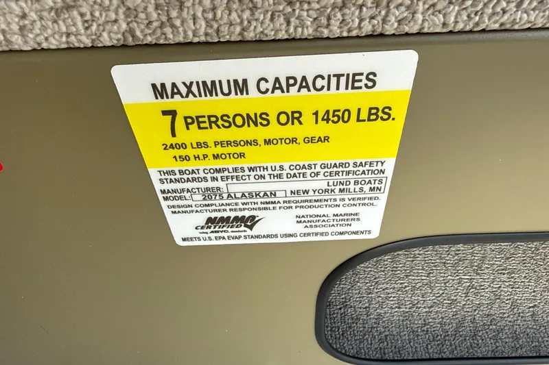 Slide: The Image of Capacity label for 2026 Lund 2075 Alaskan SS, 7 persons or 1450 lbs. - 7