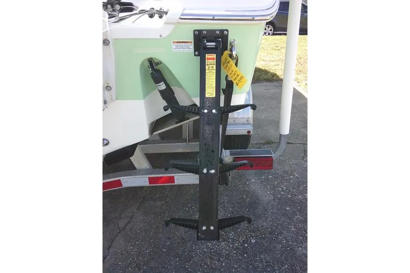 Slide: The Image of 2022 Sea Pro 259 Center Console boat trailer with stabilizing bracket. - 21