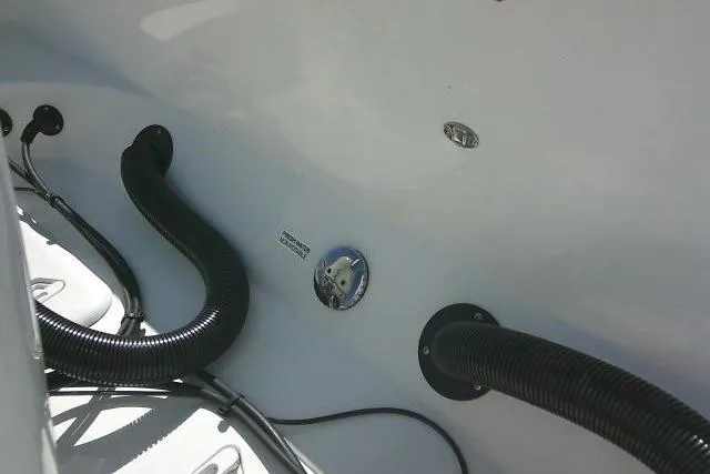 Slide: The Image of 2022 Sea Pro 259 Center Console boat interior with wiring and fittings. - 22