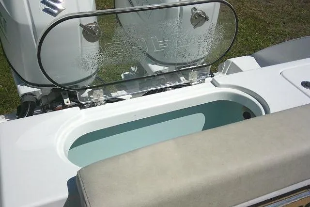 Slide: The Image of 2022 Sea Pro 259 Center Console boat with open livewell and dual engines. - 46