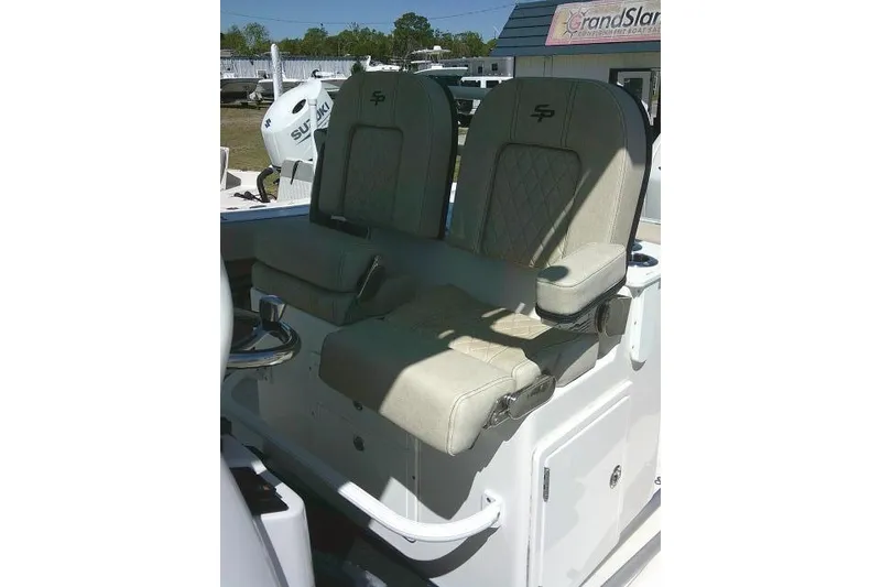 Slide: The Image of 2022 Sea Pro 259 Center Console boat seats with diamond stitching and armrests. - 52