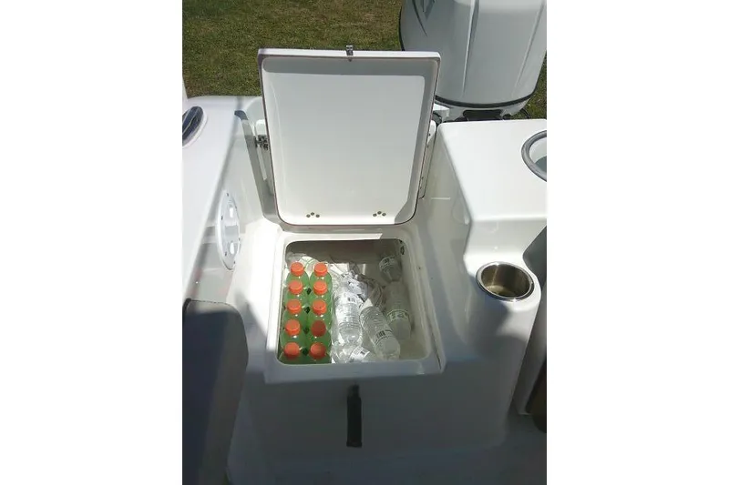Slide: The Image of Open cooler with drinks on 2022 Sea Pro 259 Center Console boat. - 55