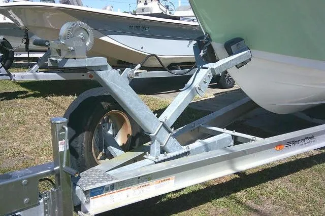 Slide: The Image of Trailer with 2022 Sea Pro 259 Center Console boat, parked on grass. - 6