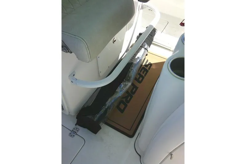 Slide: The Image of 2022 Sea Pro 259 Center Console interior with seat and storage area. - 65