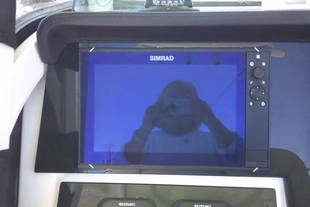 Slide: The Image of Simrad display on 2022 Sea Pro 259 Center Console boat dashboard. - 68