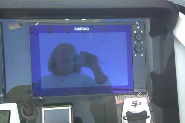 Slide: The Image of Simrad display on 2022 Sea Pro 259 Center Console boat dashboard. - 69